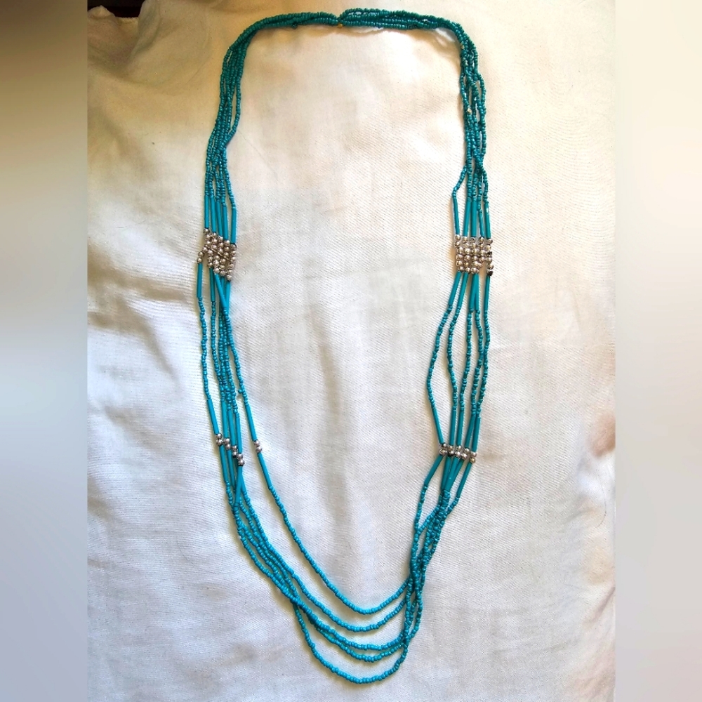 Turquoise and silver color necklace